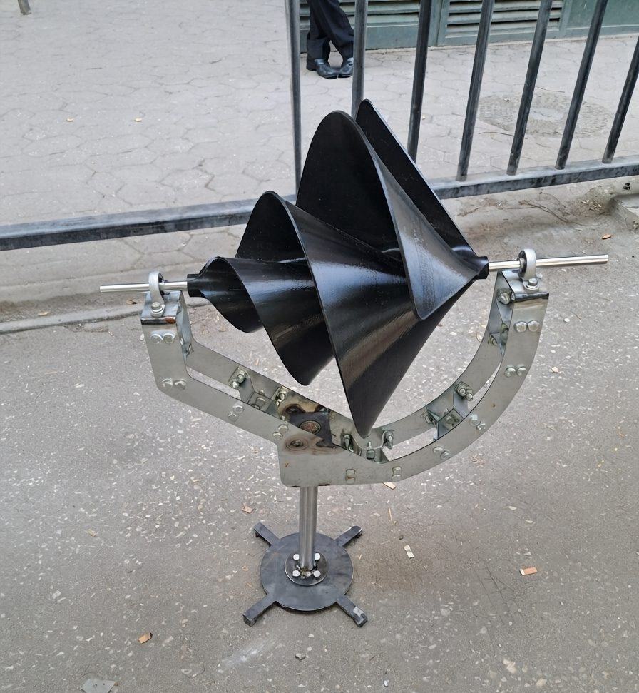 Spiral-bladed turbine prototype on a tilting bolted steel frame